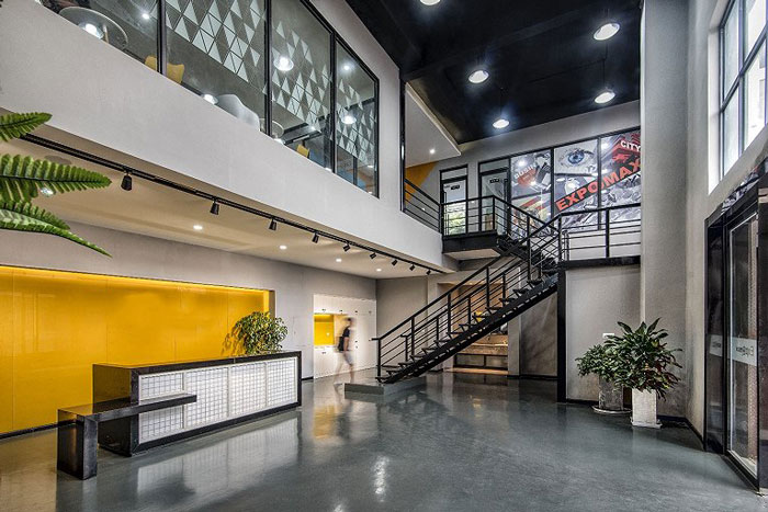 展示器材公司辦公室前臺裝修設(shè)計(jì)效果圖